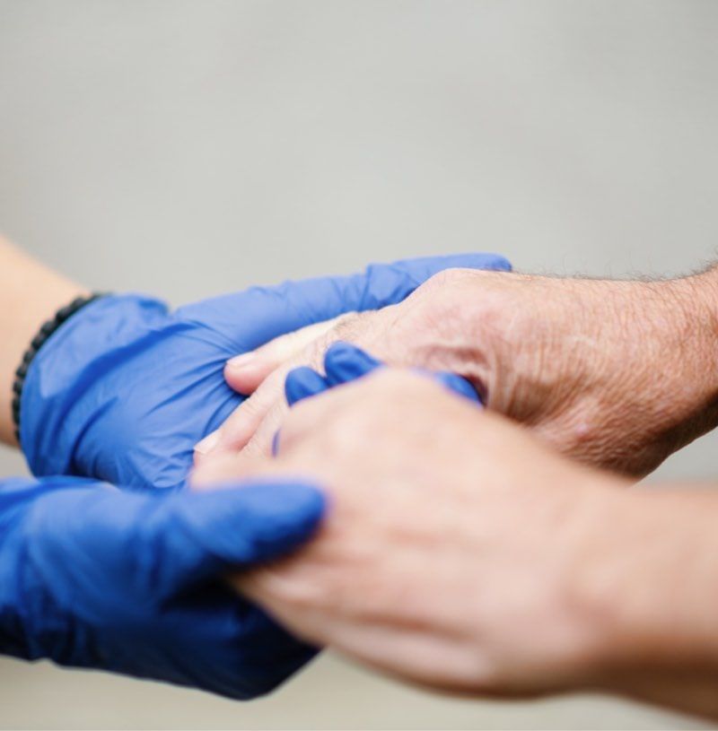 A nurse reviewing a care plan with a family member.